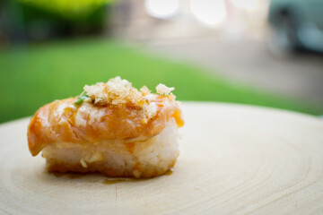 Fire-grilled tuna sushi is a simple Japanese dish. The seafood is delicious.  sushi restaurant concept