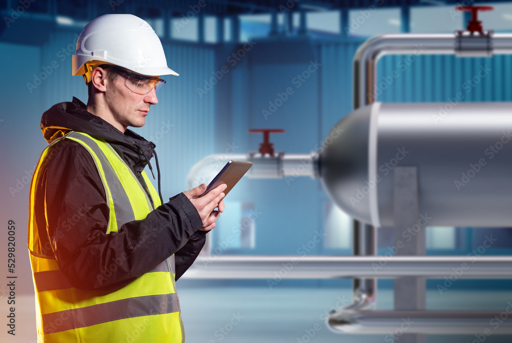 Aufkleber engineer in factory building. man with tablet in work uniform. guy in protective helmet works as eng
