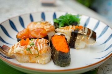 Sushi set with various faces is simple Japanese food. Delicious seafood.  sushi restaurant concept