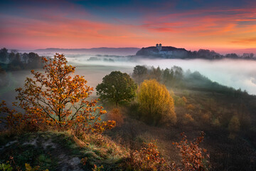 Benedictine abbey in Tyniec, foggy autumn sunrise. A monastery is located close to Kraków, Poland.