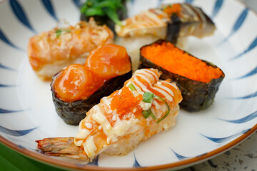 Sushi set with various faces is simple Japanese food. Delicious seafood.  sushi restaurant concept