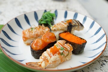 Sushi set with various faces is simple Japanese food. Delicious seafood.  sushi restaurant concept