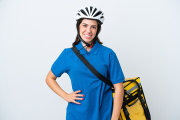Young delivery woman with thermal backpack isolated on white background laughing