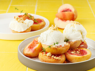 Baked peaches with ice cream