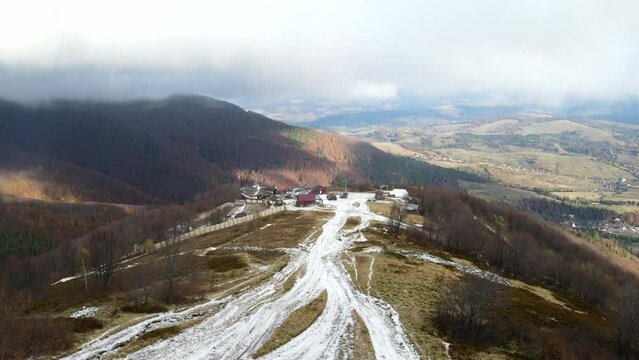 aerial view of travel landmark autumn mountains with snow