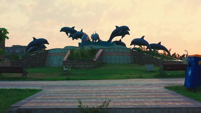 Beautiful fountain with dolphin statues in the park in Bahria Town, Islamabad, Pakistan