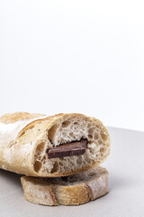 Slices of Homemade Seed Bread with a chocolate bar from above