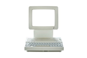 Vintage desktop computer with blank monitor screen isolated