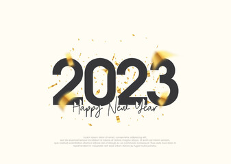 Simple design happy new year 2023 with scattered gold ribbon.