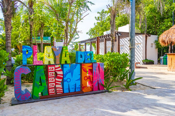 Colorful Playa del Carmen lettering sign symbol on beach Mexico.