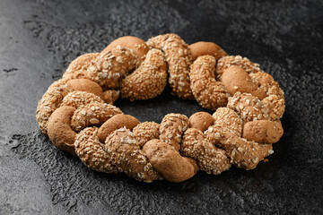Fresh Homemade braided bread on rustic dark background