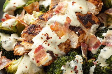 Baked chicken, broccoli with creamy cheese sauce and bacon
