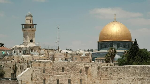 A telephoto video of the al-Aqsa Mosque right above the Western Wall site, as the camera tilts down to the plaza and back up. the old city of Jerusalem. an NTSC video clip, Jerusalem, Israel.