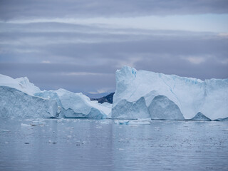 Awe-inspiring icy landscapes at the mouth of the Icefjord glacier (Sermeq Kujalleq), one of the fastest and most active glaciers in the world. Disko Bay, Ilulissat, Greenland