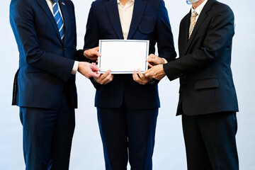 Photograph of the atmosphere during the ceremony of awarding an institution's certificate to trainees who have passed the test.