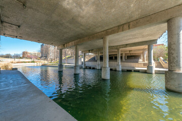 Walkway under a concrete bridge at San Antonio, Texas