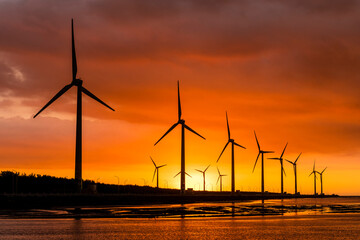 Sunset view of Gaomei wetlands landscape and the wind power plant in Taichung, Taiwan. 