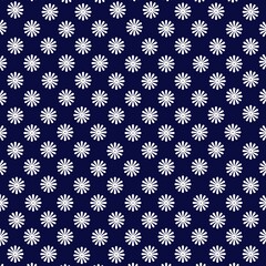 Flowers pattern on deep blue background. Little white flowers pattern