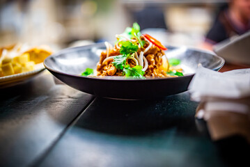 plate with food on table in cafe