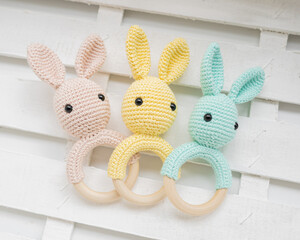 Three crocheted bunny rattles