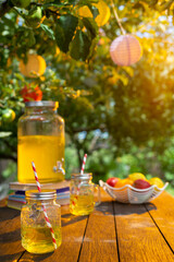 Drink station for an outdoor party. Abstract Festival in garden with bokeh for background usage.
