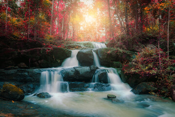 beautiful colorful waterfall in forest. amazing wonderful landscape paradise scenic background.