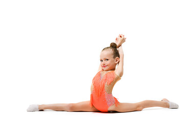 Little flexible gymnast girl sit in split