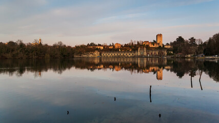 Fototapeta premium Trezzo power plant reflected on Adda river, Trezzo, Po Valley