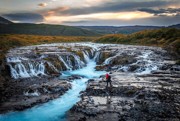 Bruarfoss Waterfall. Iceland. fantastic South Iceland with a colorful sunset an blue water. Iceland is a most popular place of travel. Travel is a Lifestyle, concept. - obrazy, fototapety, plakaty