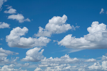 Blue sky with white clouds. Sky and clouds during the daytime in the summer.