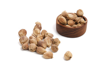 White Cardamom on wooden saucer isolated white background