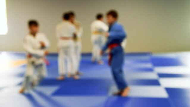 Children are exercising. Judo. Blurred.