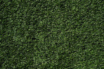 Obraz premium Green football grass background. Soccer stadium field.