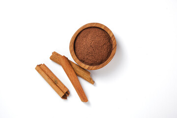 cinnamon sticks and powder  isolated on white background