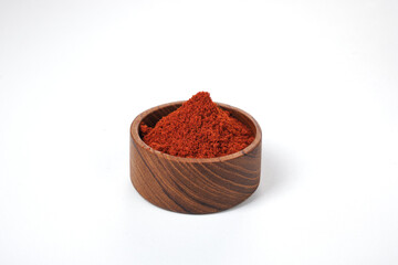 dried red hot peppers powders isolated on white background