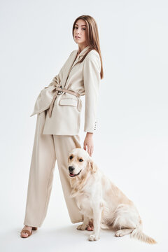 model posing with dog