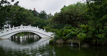 Naklejka na ściany i meble Chinese style garden park with water pond