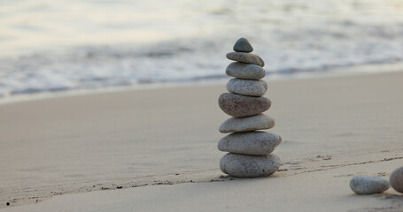 Fototapeta na wymiar Zen stones on the beach