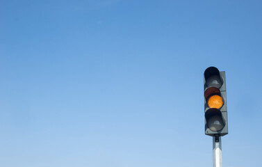 Traffic lights, traffic lights that turn on show orange or yellow lights as a warning sign....