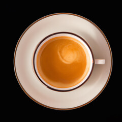 White cup of coffee with saucer on black background