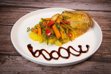 Grilled chicken leg and fresh vegetable salad, Healthy food, wood background, High quality photo