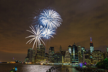 fireworks of independence day 4th of july Brooklyn Old Pier looking at One World Trade Center...