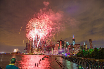 fireworks of independence day 4th of july Brooklyn Old Pier looking at One World Trade Center...