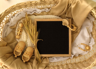 Letter board Baby Announcement with basket. Baby Clothing Mock Up . Space for design . Pregnancy...