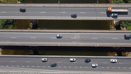 Three line bridge above Nerius river, Kaunas, Lithuania, Central Europe. Cars, trucks, differnt angel of view on same bridge