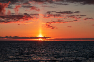 Watching the sunset at the port of Puerto de la Cruz, Tenerife, Canary Islands, Spain, Europe. View...