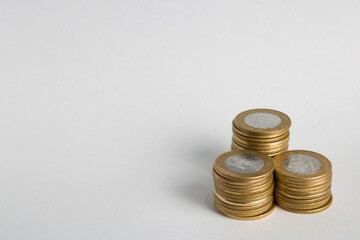 Set of coins on white background. Photo for use in financial topics, representing profit, economic...