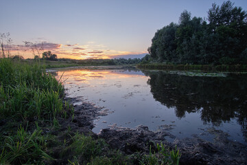 Quiet evening over a rural lake