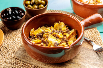 Eggs Awarma served in dish isolated on wooden table side view of middle eastern food