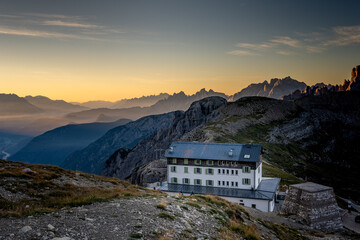 Rifugio Auronzo at sunrise Hiking trail to the Drei Zinnen Hütte in the Dolomites in South Tyrol,...